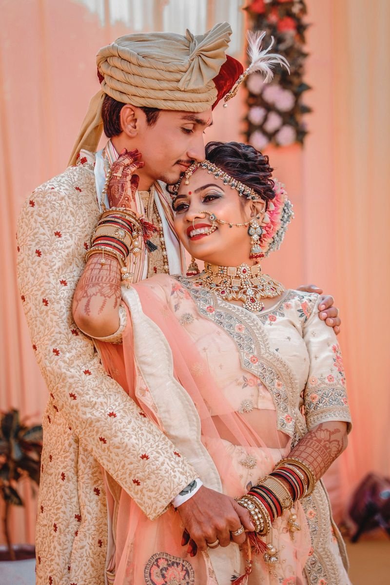 A newly married couple in traditional South Indian attire